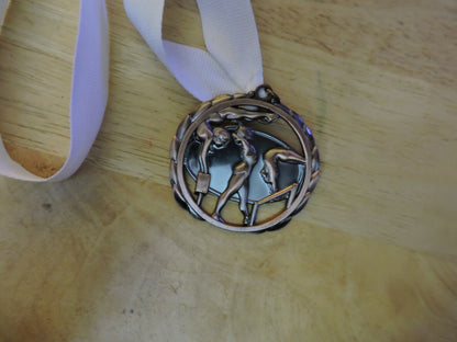 GYMNASTIC BRONZE COLORED 2.5 INCH MEDAL WITH WHITE RIBBON