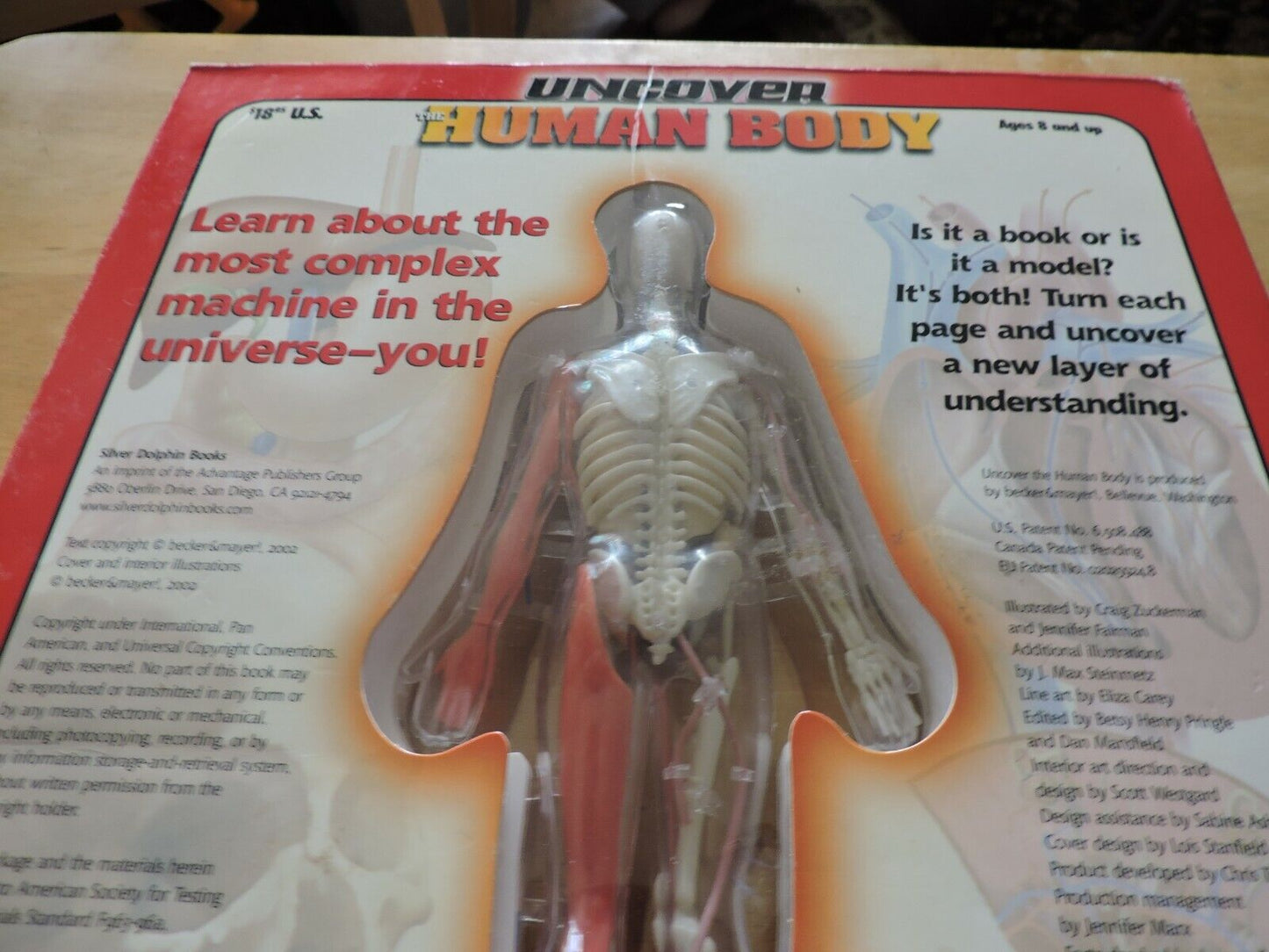 UNCOVER THE HUMAN BODY  THREE DIMENSIONAL LOOK INSIDE THE BODY. 2002