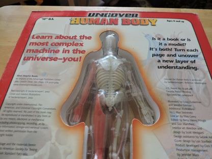 UNCOVER THE HUMAN BODY  THREE DIMENSIONAL LOOK INSIDE THE BODY. 2002