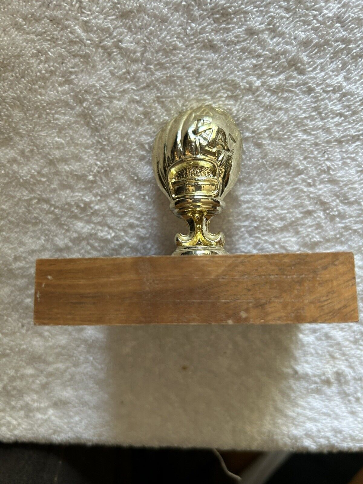 TROPHY: BASEBALL GLOVE--PLASTIC--WOOD BASE--3.75X3.5X3 INCHES