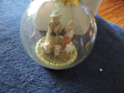 GLASS CHRISTMAS ORNAMENT--SHEPHERD, CHILD, LAMBS
