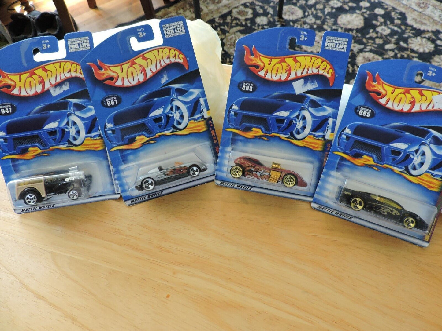 HOT WHEELS SET OF FOUR CARS--# 047, 081, 083, 085