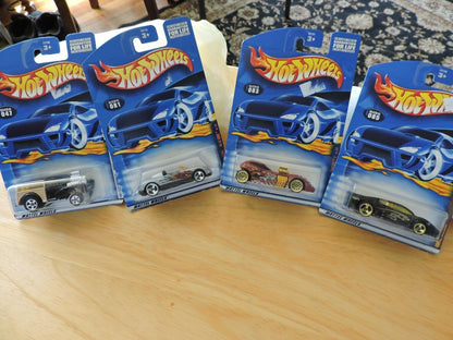 HOT WHEELS SET OF FOUR CARS--# 047, 081, 083, 085