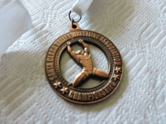 SANTA CLARA VALLEY  WRESTING ASSOCIATION CHAMPSHIP ROUND MEDAL ON WHITE RIBBON
