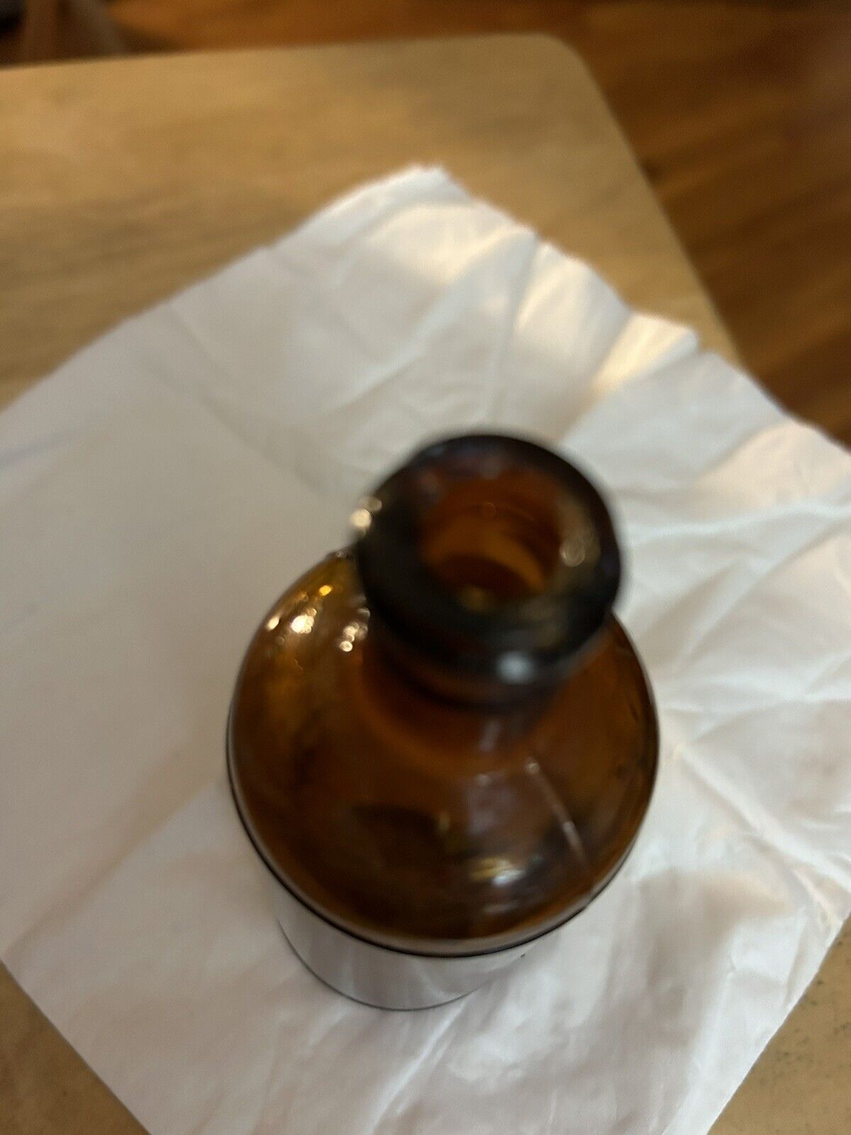BROWN ROUND BOTTLE UNMARKED 4.5 X 1.75 INCHES EMPTY