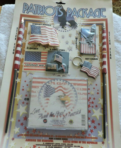 PATRIOT PACKAGE: 2 STICK FLAGS, BELT BUCKLE, MAGNET, 3 FLAG DECALS, 3 LAPEL PINS