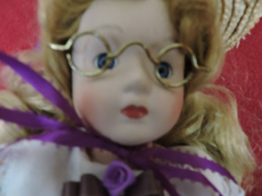 18 INCH PORCELAIN DOLL WITH GLASSES