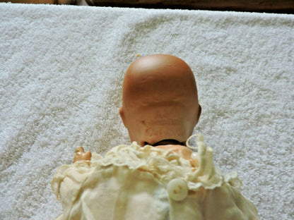 VINTAGE ARMANO MARSEILLE  GERMAN DOLL  1924 SOLID-DOMEQIQUE  IN WICKER BASKET