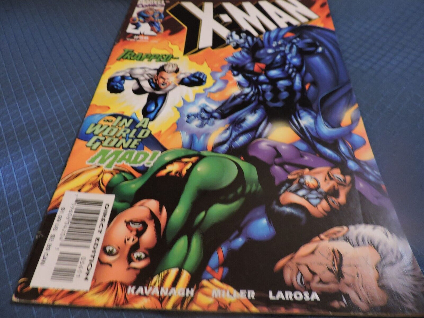 X MAN TRAPPED N A WORLD GONE MAD! NO.  56 OCTOBER 1999