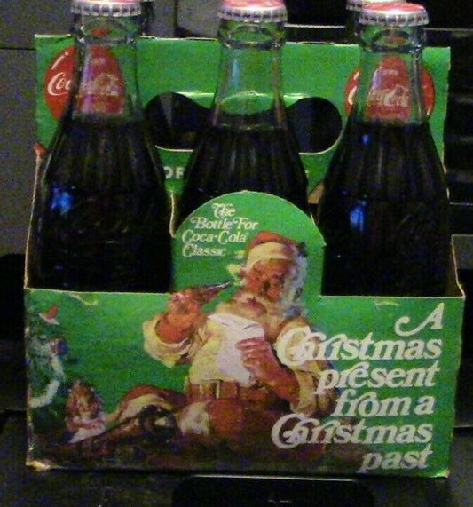 6 Pack of Coca Cola Bottles Celebrating Christmas