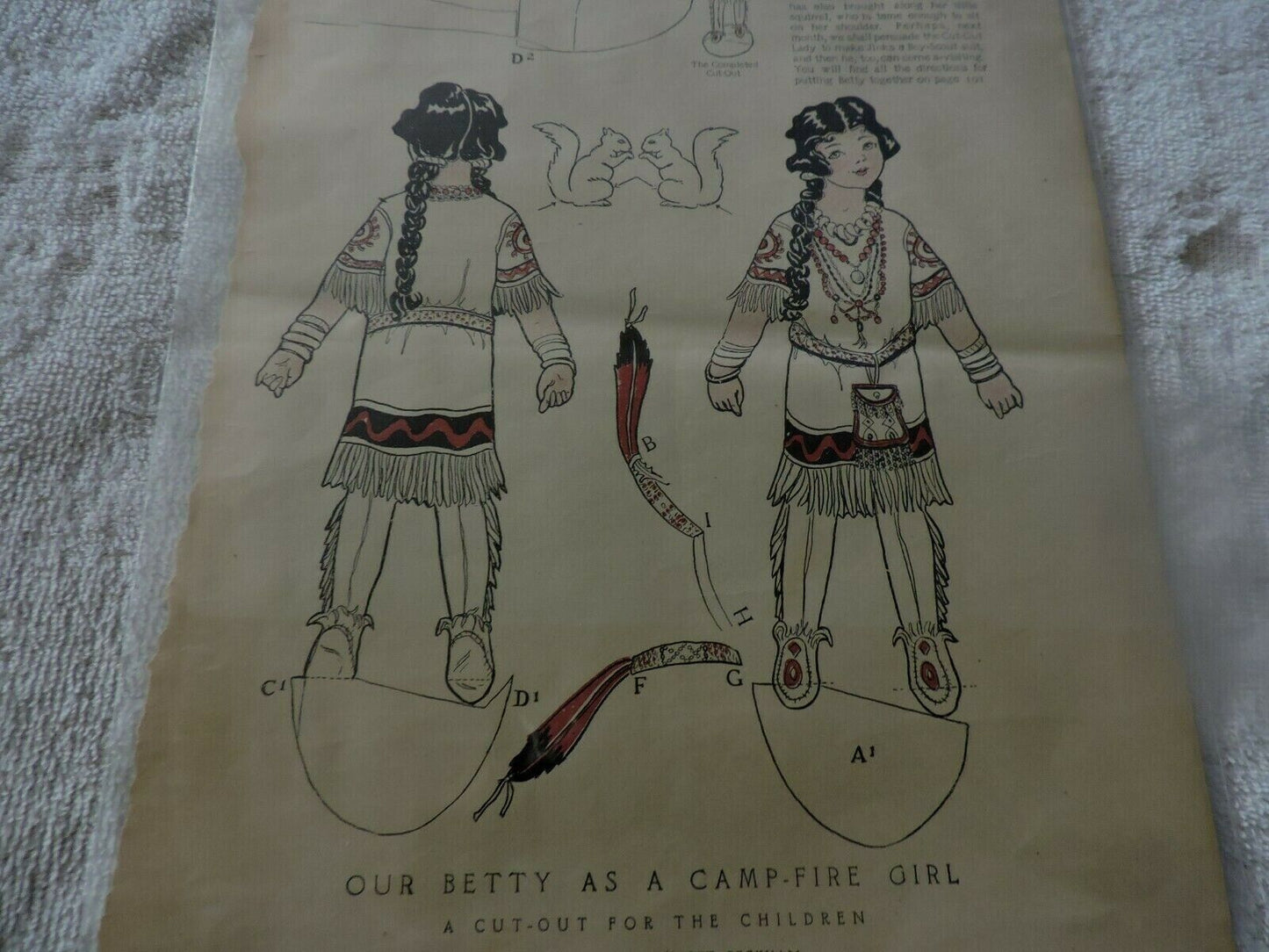 FEBRUARY 1914: " OUR BETTY AS A CAMP FIRE GIRL" CUT OUT: DESIGNED BY MARGARET PE