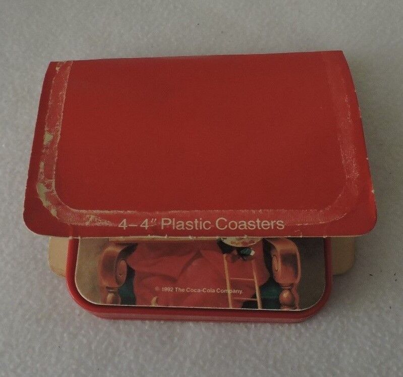 4 Plastic Coca-Cola 4" Santa Themed Coasters
