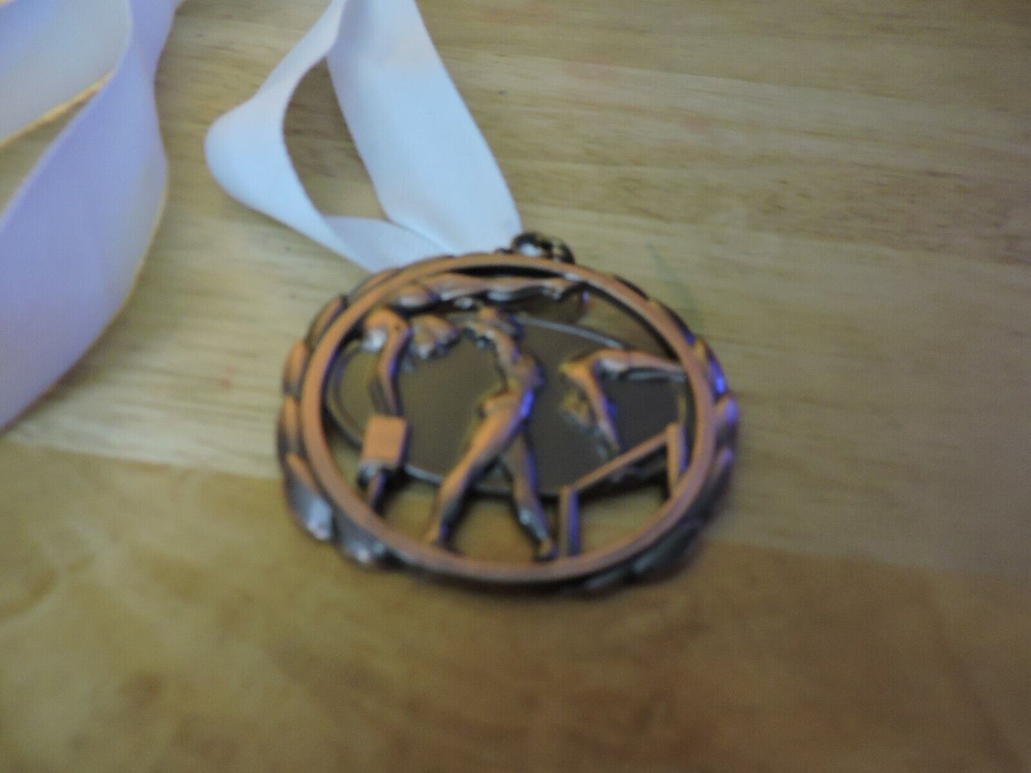 GYMNASTIC BRONZE COLORED 2.5 INCH MEDAL WITH WHITE RIBBON