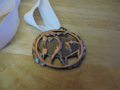 GYMNASTIC BRONZE COLORED 2.5 INCH MEDAL WITH WHITE RIBBON