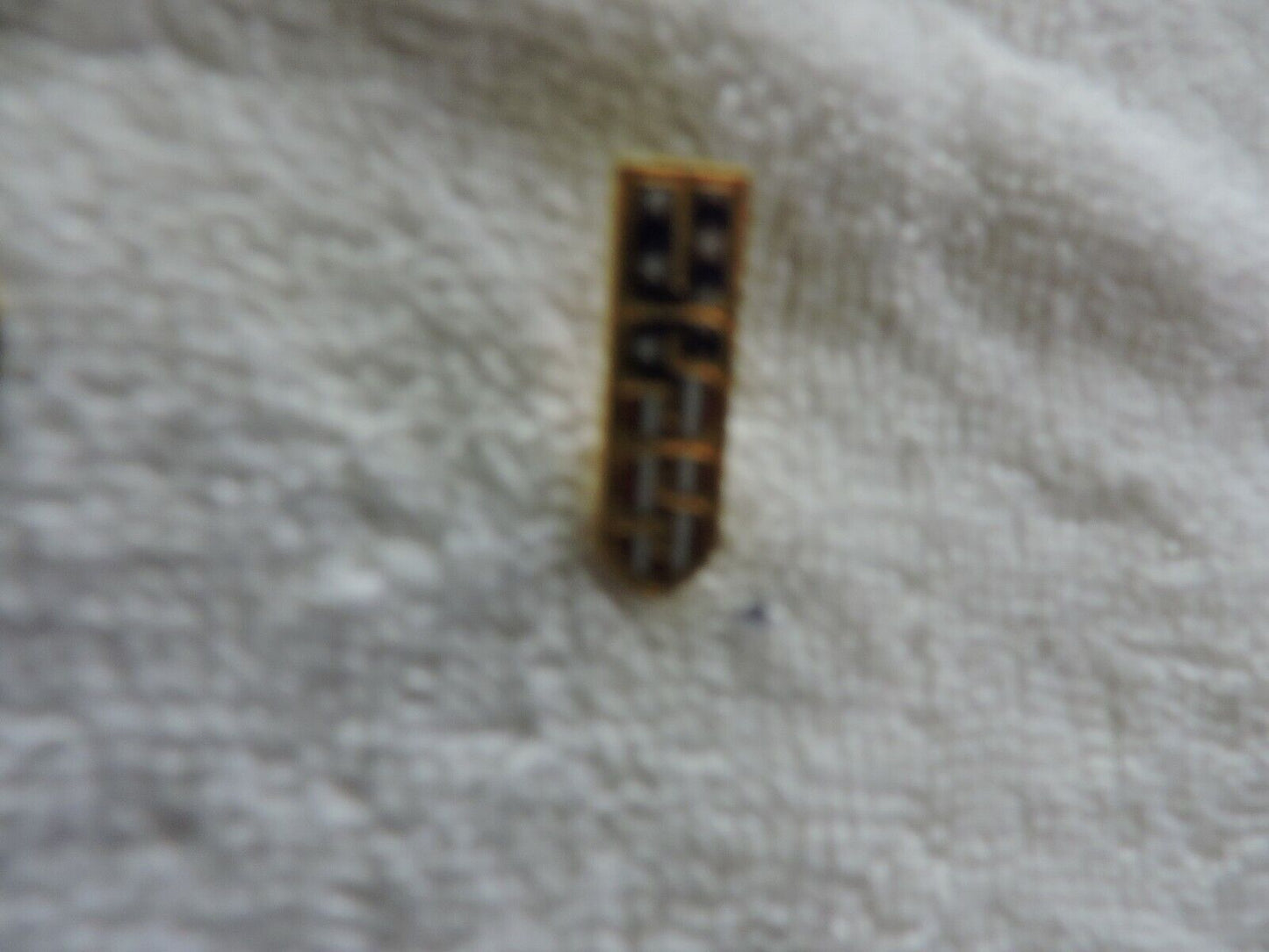 USS SWIMMING RED, WHITE AND BLUE PIN 1  X .25 INCHES