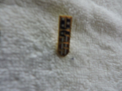 USS SWIMMING RED, WHITE AND BLUE PIN 1  X .25 INCHES