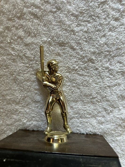 TROPHY: BATTER --PLASTIC--WOOD BASE--4.5X3.5X 4 INCHES