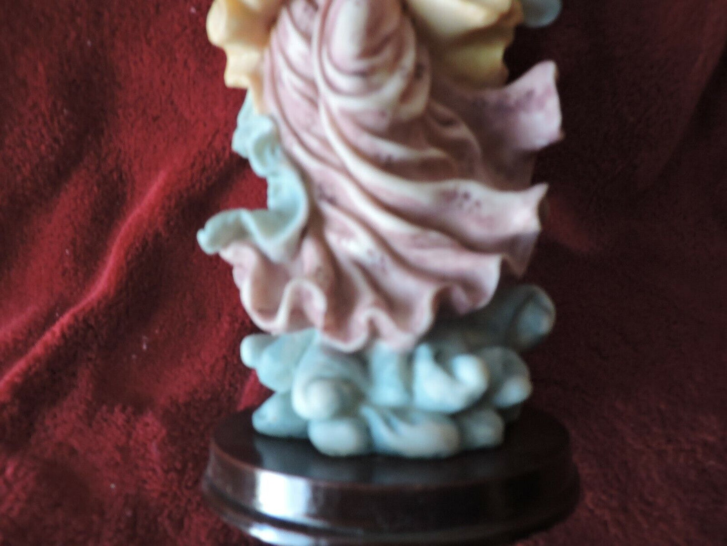 ANGEL HOLDING BABY PORCLAIN FIGURINE