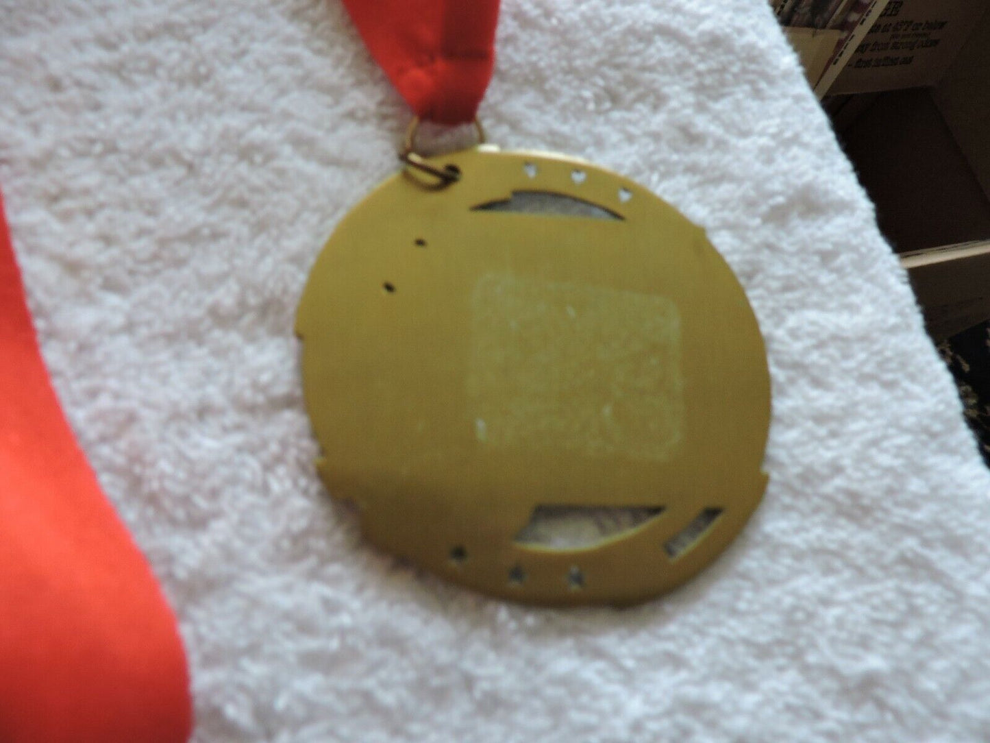 TRACK AND FIELD/RUNNING MEDAL 2.75 INCH ROUND WITH RED RIBBON
