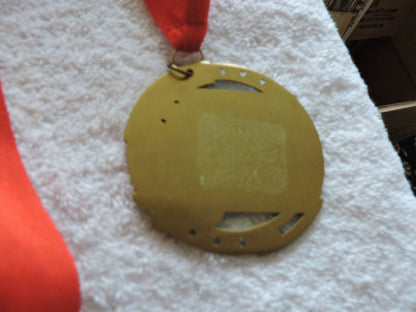 TRACK AND FIELD/RUNNING MEDAL 2.75 INCH ROUND WITH RED RIBBON