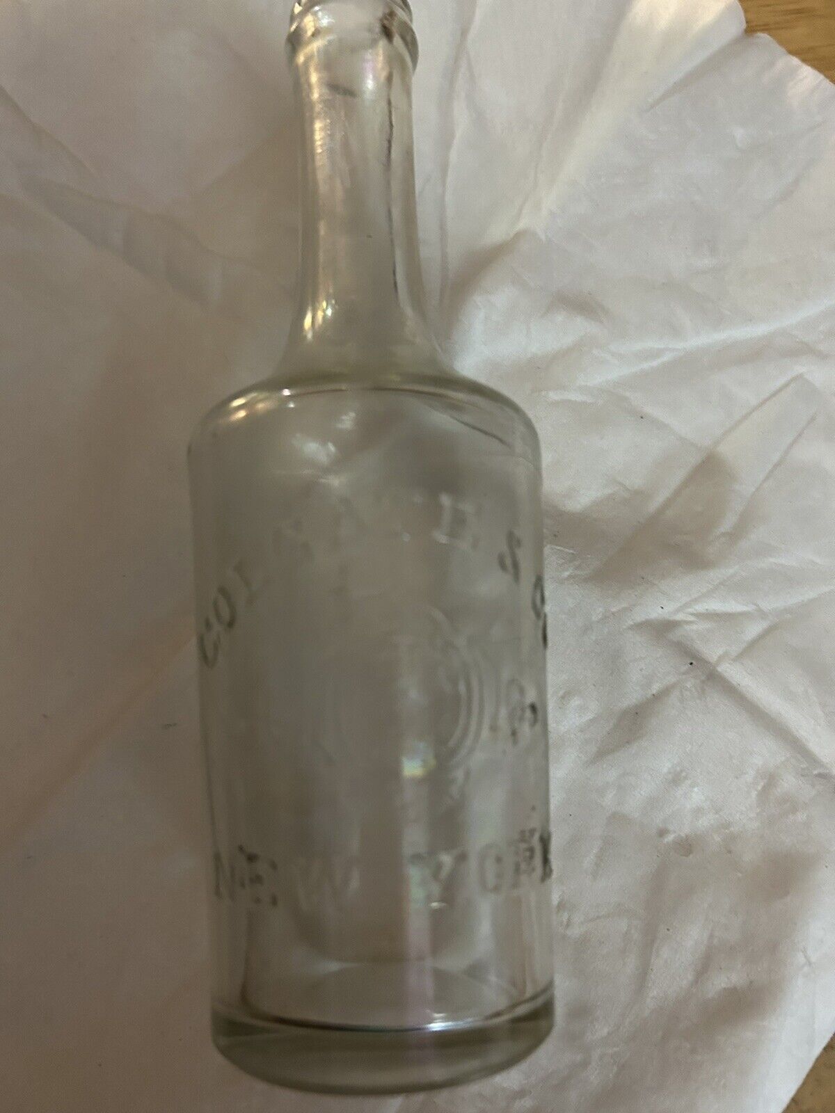 CLEAR  LONG NECK ROUND BOTTLE COLGATE & COMPANY NEW YORK, 5.5X1.5 INCHES
