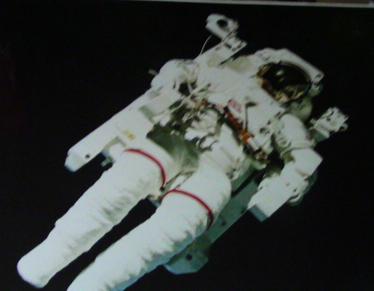 Nasa Space Collection: Astronaut Propelled by a Manned Maneuvering Unit 1990