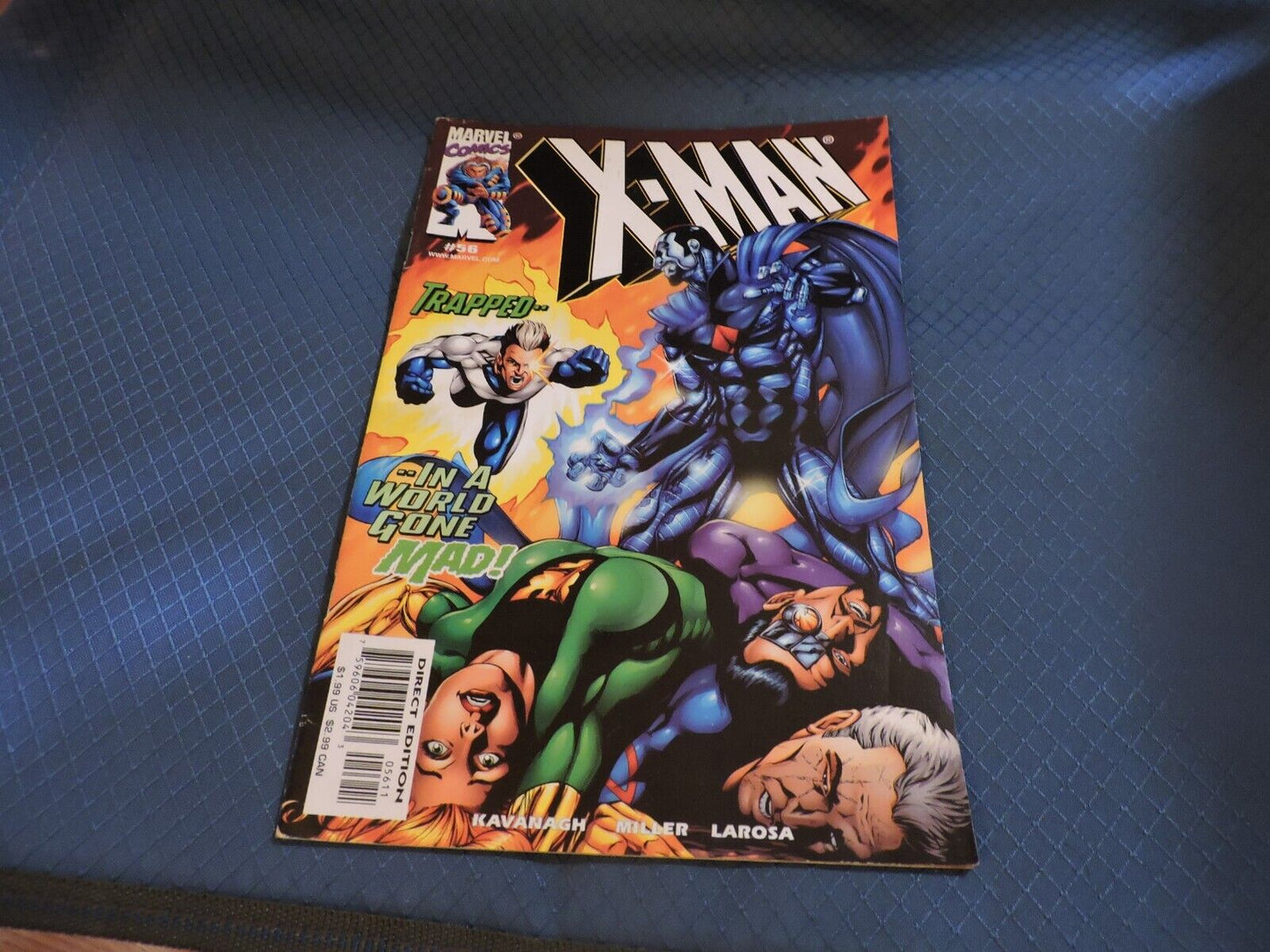 X MAN TRAPPED N A WORLD GONE MAD! NO.  56 OCTOBER 1999