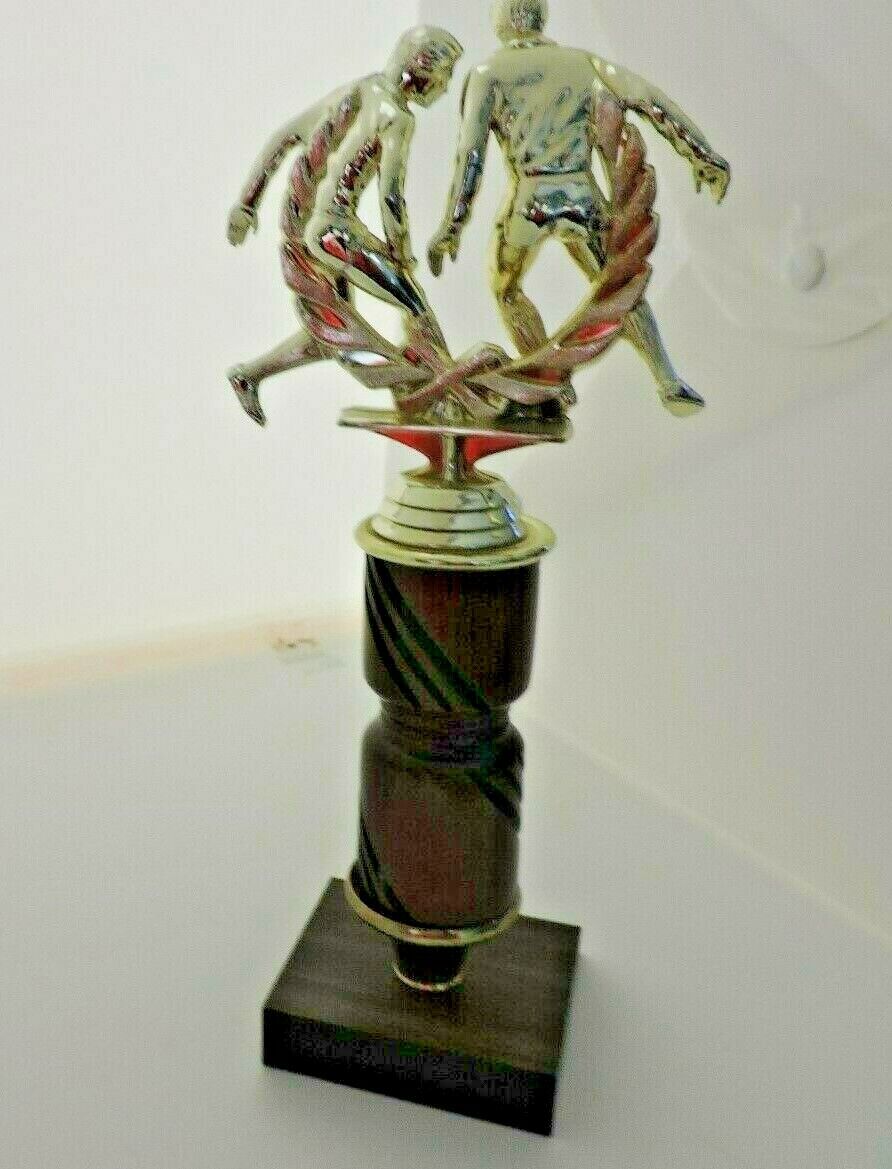 SOCCER TROPHY--10.5  INCHES TALL, 3X4 INCH WHITE MARBEL BASE