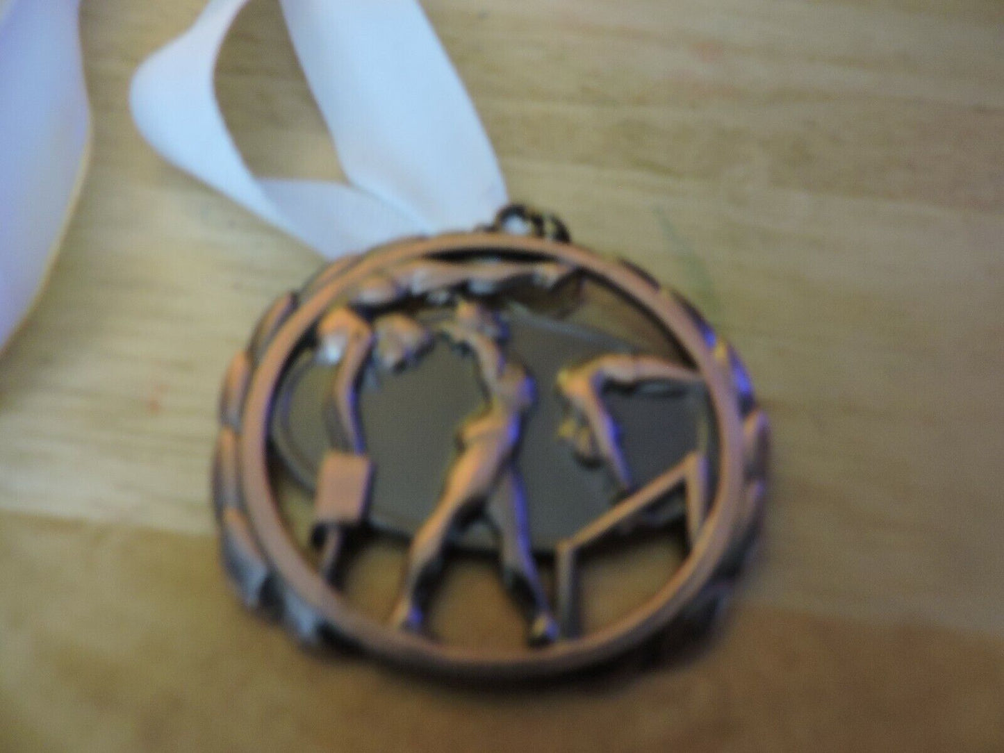 GYMNASTIC BRONZE COLORED 2.5 INCH MEDAL WITH WHITE RIBBON