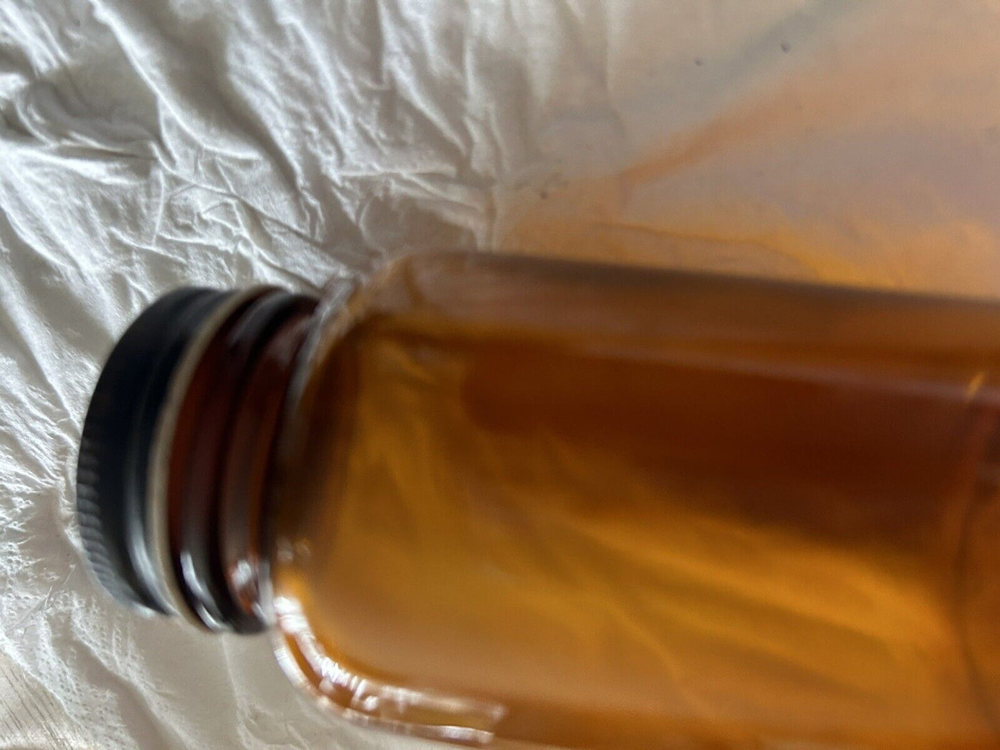 ROUND  BROWN BOTTLE--EMPTY--NO LABEL 3.75 X 2 INCHES