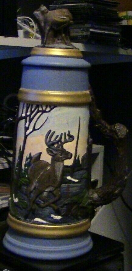 CERAMIK MUG WITH DEER FAMILY PAINTED ON IT  15.5 INCHES TALL/ TOP 4 INCHES BASE