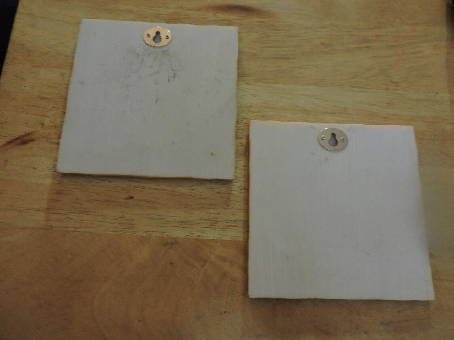 PAIR OF CERAMIC PLAQUES (WALL HANGINGS) 5.5X5.5 INCHES