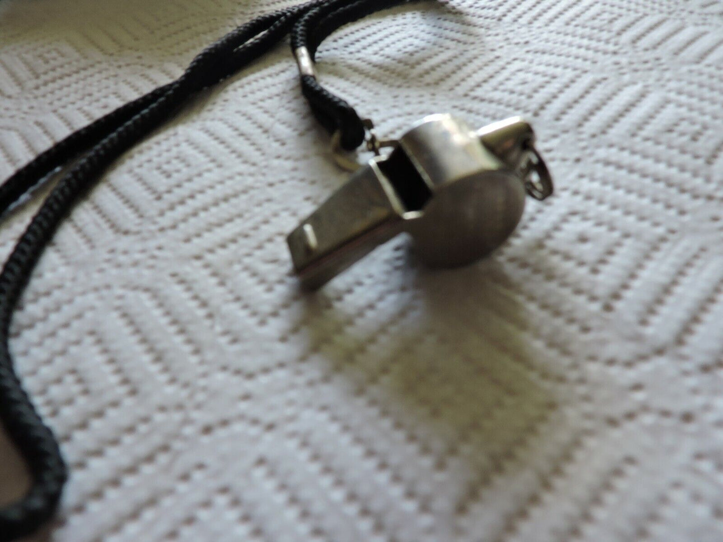 VINTAGE BRASS WHISTLE (WINDSOR CLARION) WITH BLACK LANYARD