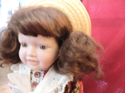 BRINN PORCELAIN DOLL--12 INCHES---1992
