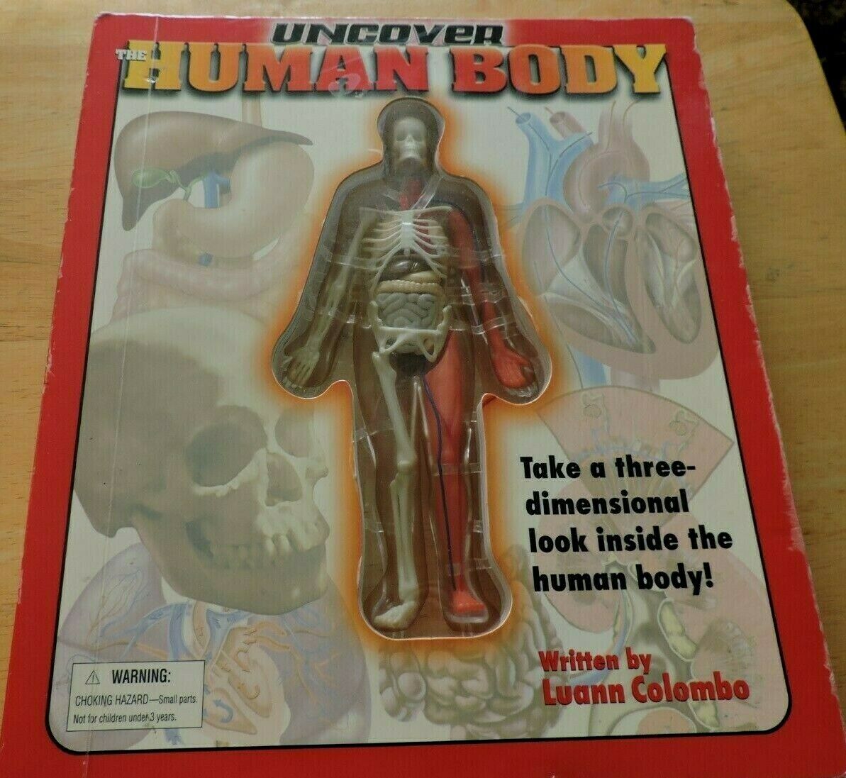 UNCOVER THE HUMAN BODY  THREE DIMENSIONAL LOOK INSIDE THE BODY. 2002