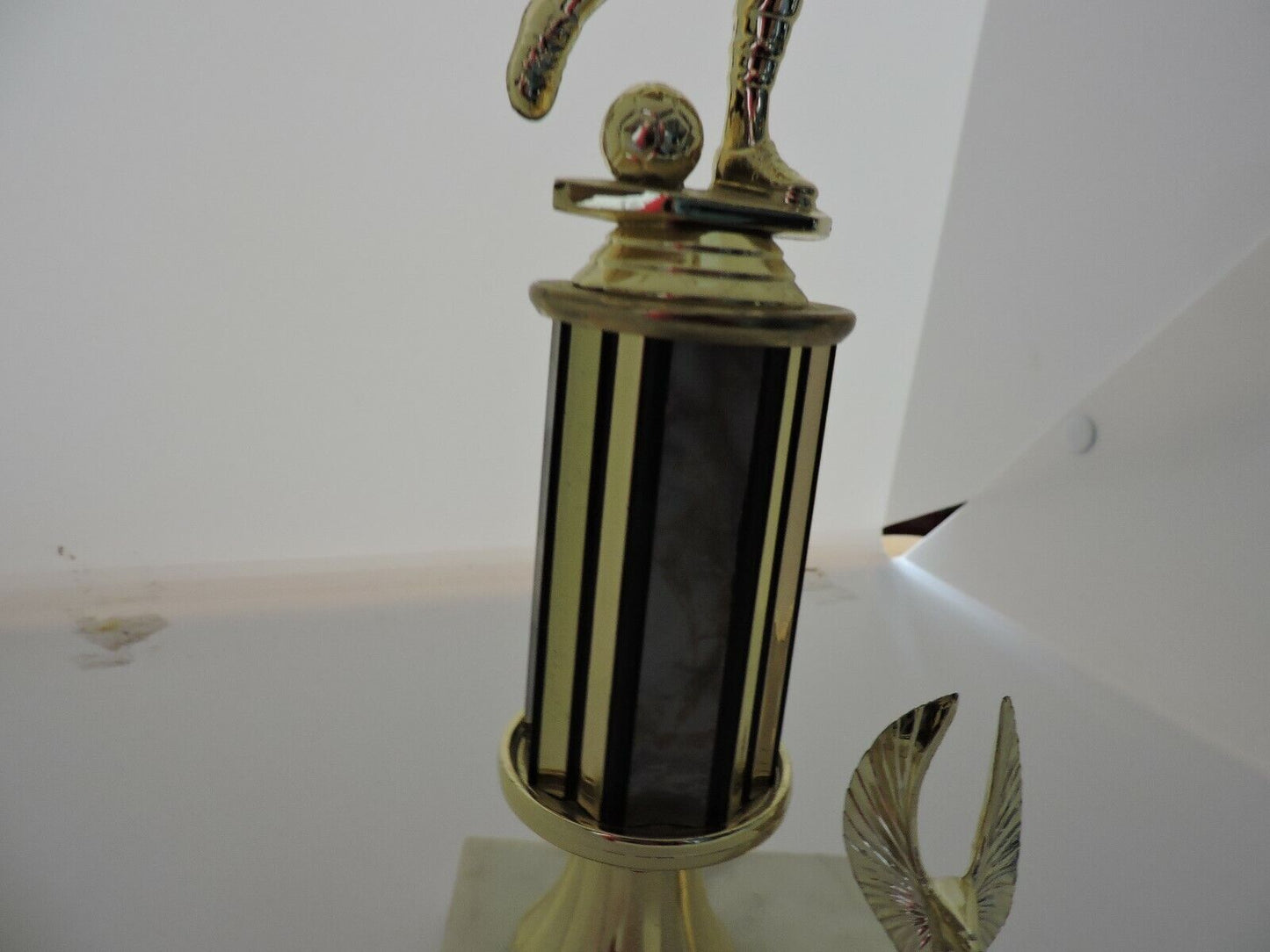 SOCCER TROPHY--10.5  INCHES TALL, 3X4 INCH WHITE MARBEL BASE