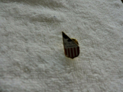 USA SWIMMING RED, WHITE AND BLUE PIN 1  X .5 INCHES