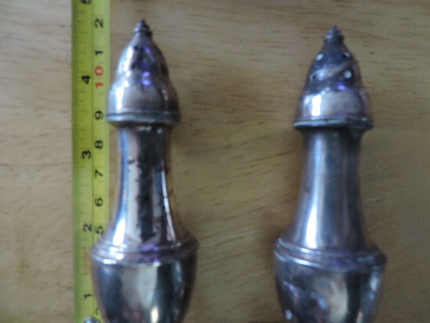 SILVER SALT AND PEPPER SHAKERS:  (5X1.5 INCHES) MADE IN THE USA