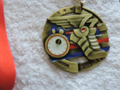 TRACK AND FIELD/RUNNING MEDAL 2.75 INCH ROUND WITH RED RIBBON