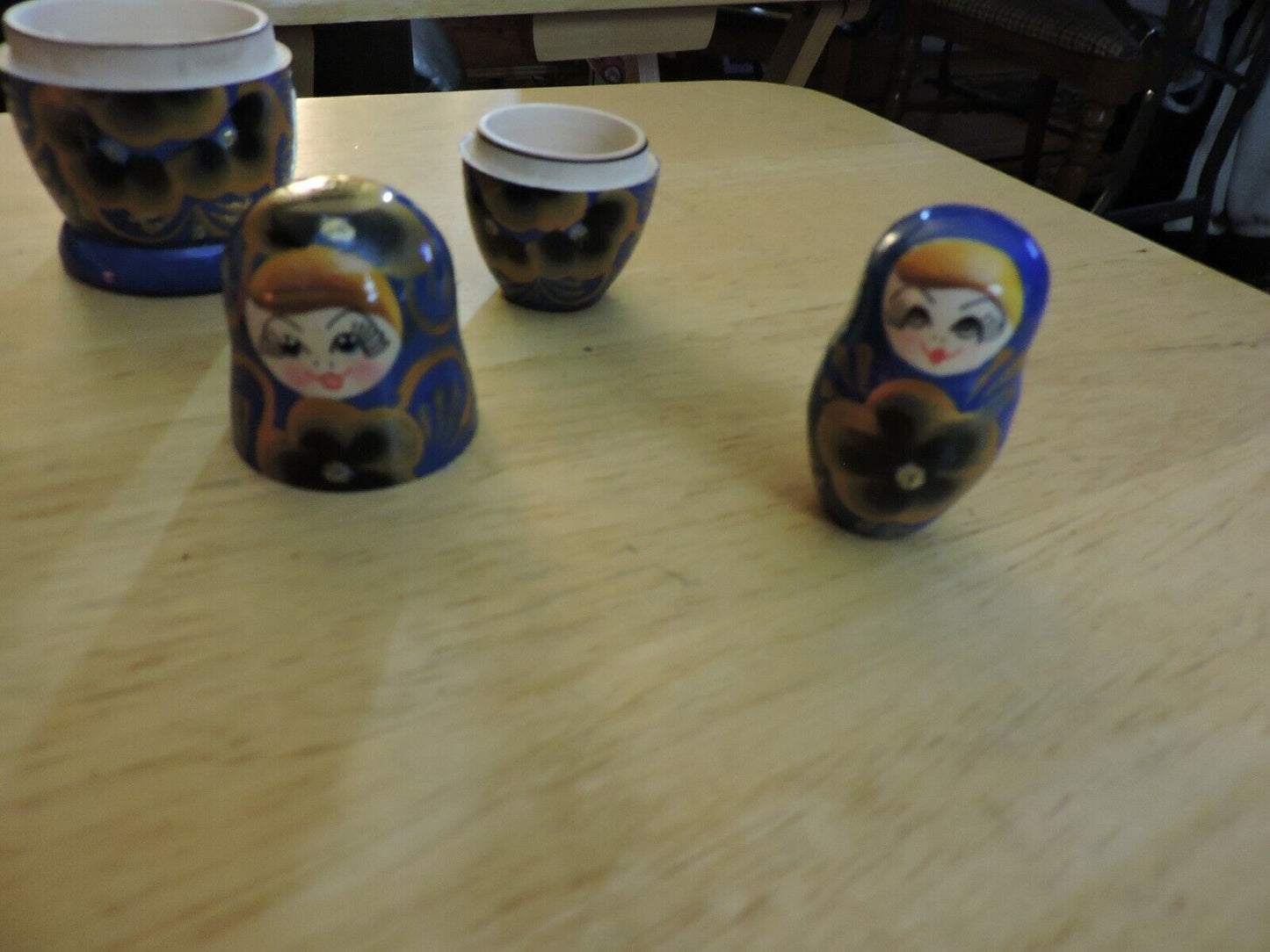 SET OF FIVE  WOODEN NESTING DOLLS (LARGEST 4 INCHES TALL)