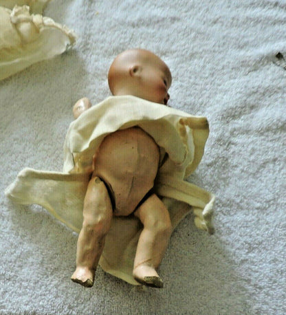 VINTAGE ARMANO MARSEILLE  GERMAN DOLL  1924 SOLID-DOMEQIQUE  IN WICKER BASKET