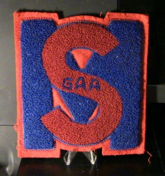 Athletic Letter, "SM" (GAA) Red and Blue on Red Background