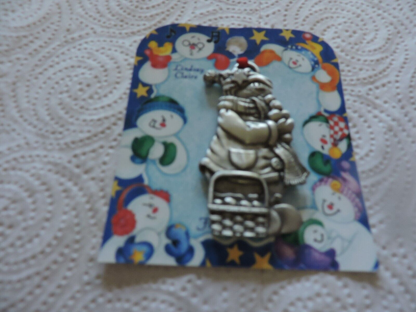 A LINDSAY CLAIRE DESIGN PEWTER SMOWWOMAN ORNAMENT