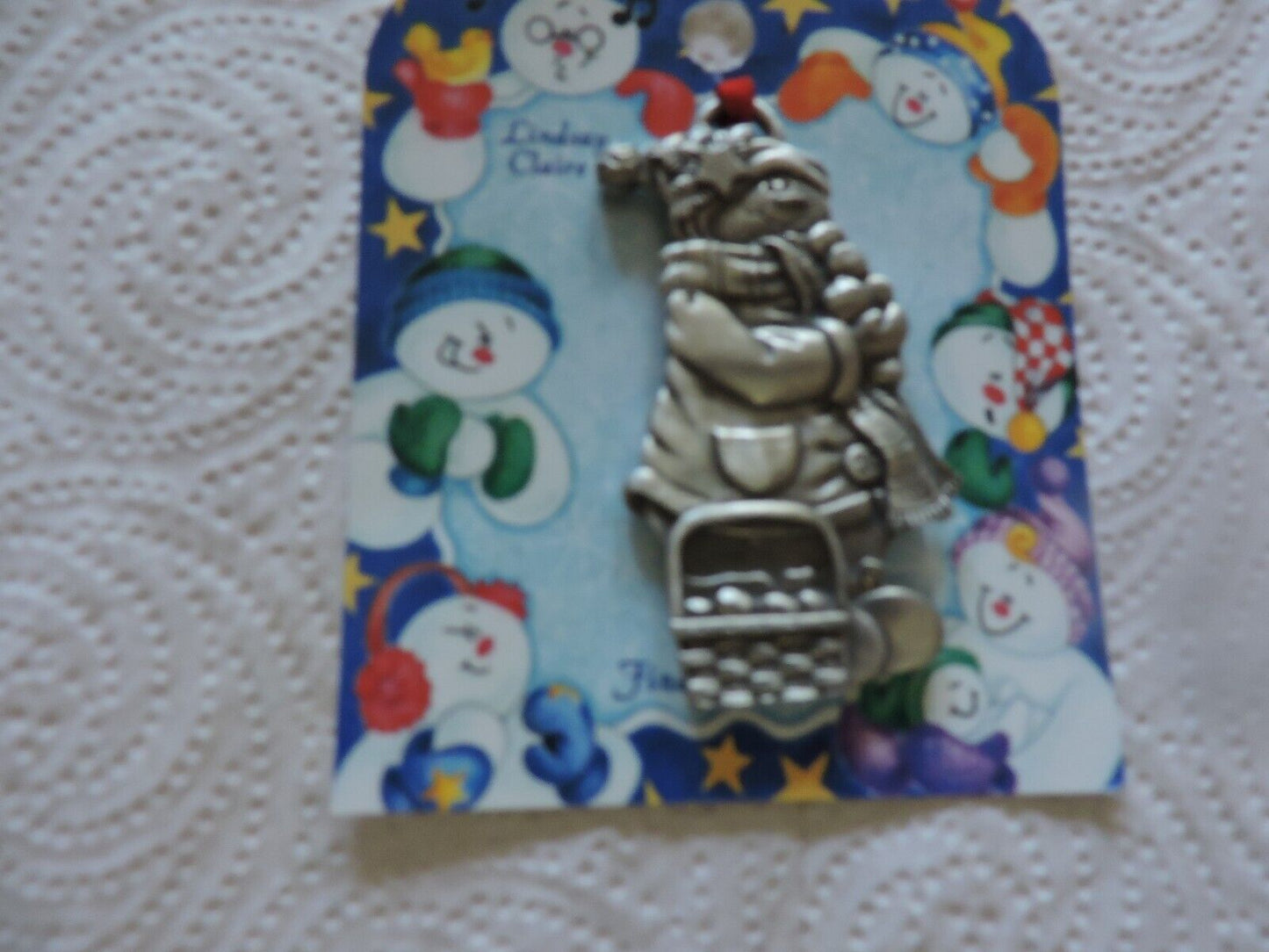 A LINDSAY CLAIRE DESIGN PEWTER SMOWWOMAN ORNAMENT