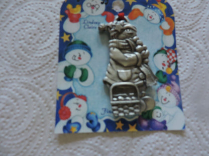 A LINDSAY CLAIRE DESIGN PEWTER SMOWWOMAN ORNAMENT