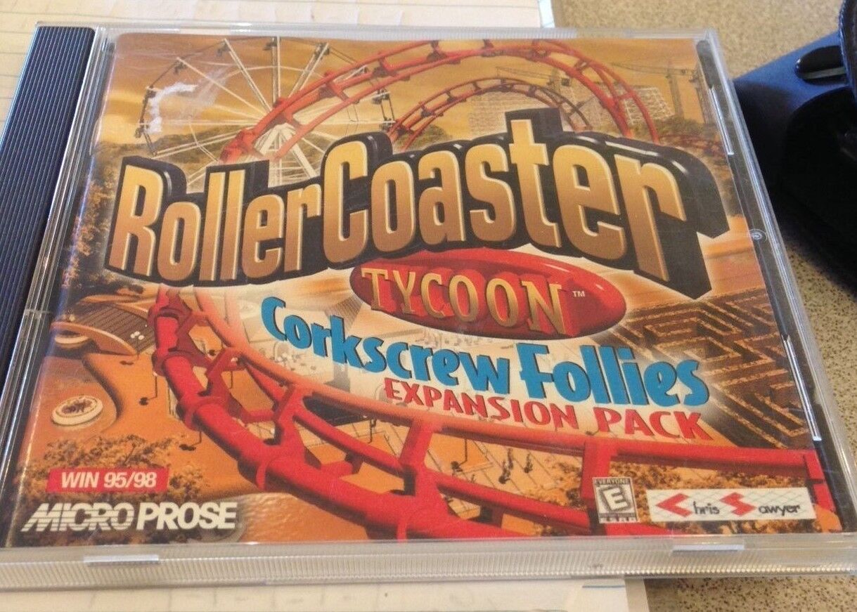 RollerCoaster Tycoon 1 Corkscrew Follies PC CD amusement park sim game add-on!