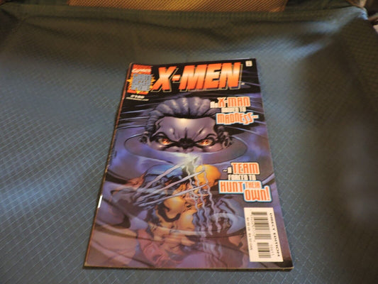 X-MEN: AN X-MAN DRIVEN TO MADNESS, A TEAM FORCED TO HUNT THEIR OWN!  #106 2000