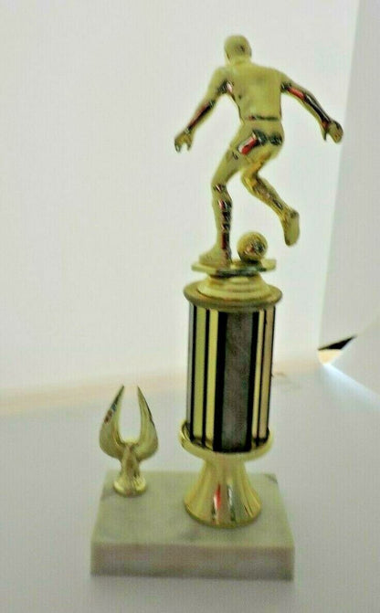 SOCCER TROPHY--10.5  INCHES TALL, 3X4 INCH WHITE MARBEL BASE