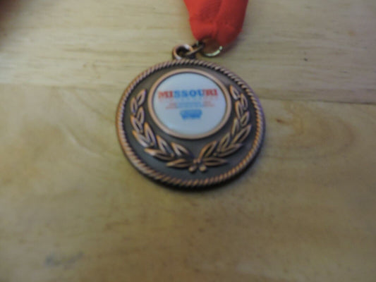 MEDAL MISSOURI WINTER GAMES 10 TH ANNUAL SPRINGFIELD MO 2 INCHES RED RIBBON