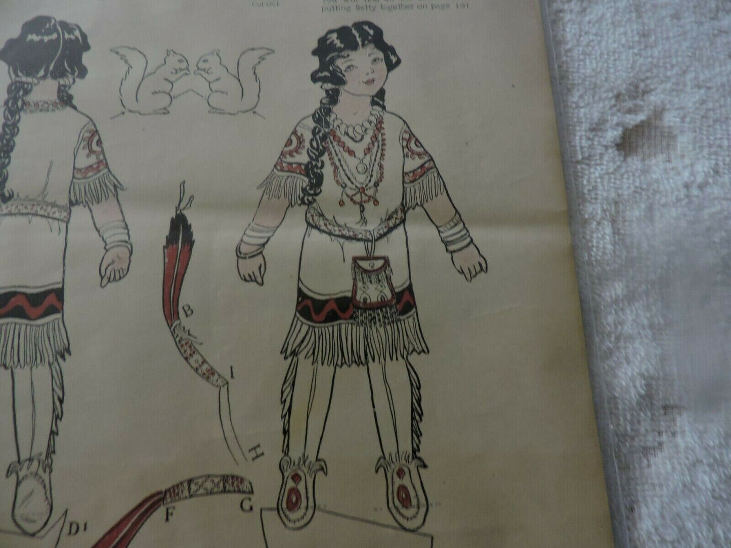 FEBRUARY 1914: " OUR BETTY AS A CAMP FIRE GIRL" CUT OUT: DESIGNED BY MARGARET PE